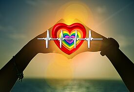 Herz mit Pulsanzeiger in Regenbogenfarben
