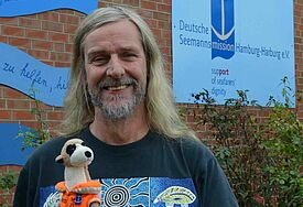 Jan Oltmanns mit Maskottchen Fred
