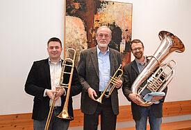 Daniel Rau (Landesposaunenwart für den Südbezirk), Propst i.R. Kurt Puls (Landesobmann der Posaunenmission Hamburg - Schleswig-Holstein) und Werner Petersen (Landesposaunenwart für den Nordbezirk).