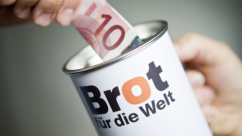 Spendendose von Brot für die Welt