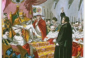 Luther auf dem Reichstag in Worms vor Kaiser Karl V. und den Kurfürsten. Kupferstich von Johann Nusbiegel (c) epd-bild/akg-images