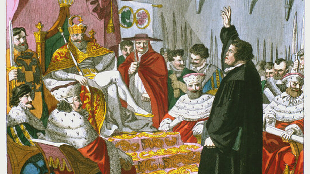 Luther auf dem Reichstag in Worms vor Kaiser Karl V. und den Kurfürsten. Kupferstich von Johann Nusbiegel