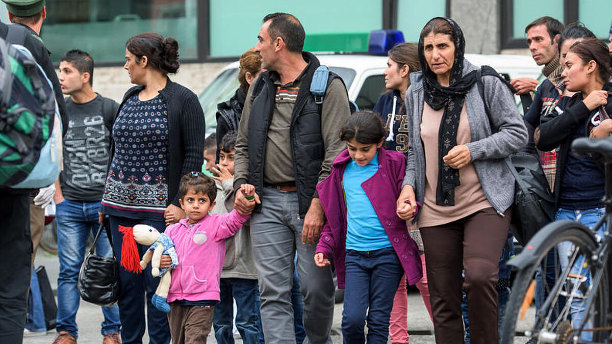 Flüchtlinge bei ihrer Ankunft in Deutschland