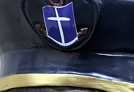 Schirmmütze mit dem Logo der Seemannsmission